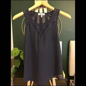 Flowy Navy Blouse with Lace Neckline Detail